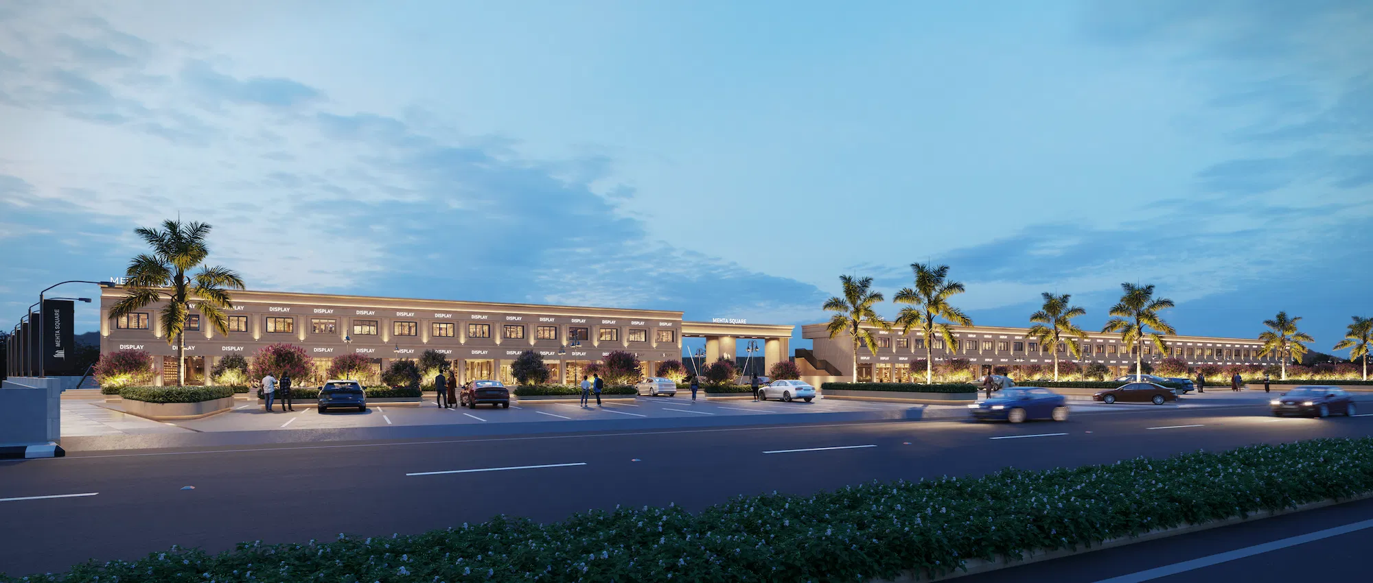 Commercial frontage along the highway at dusk